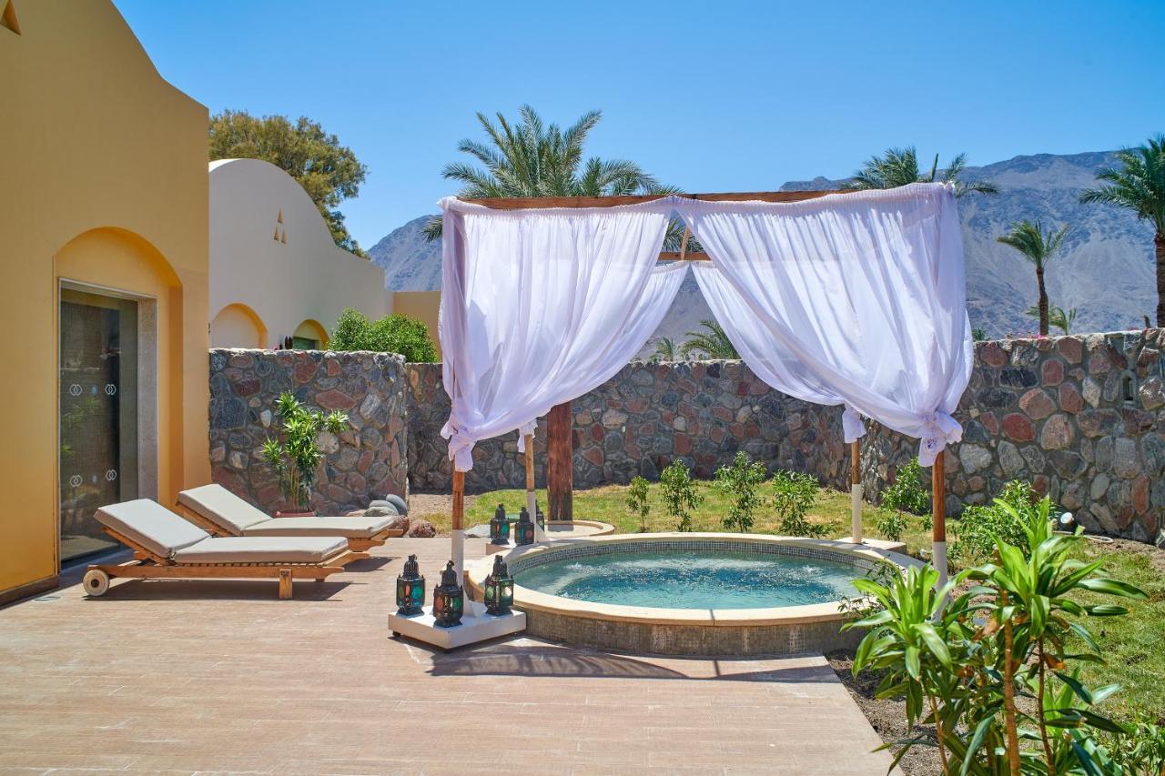 Mosaique Beach Resort Taba Heights Экстерьер фото A private pool at a hotel