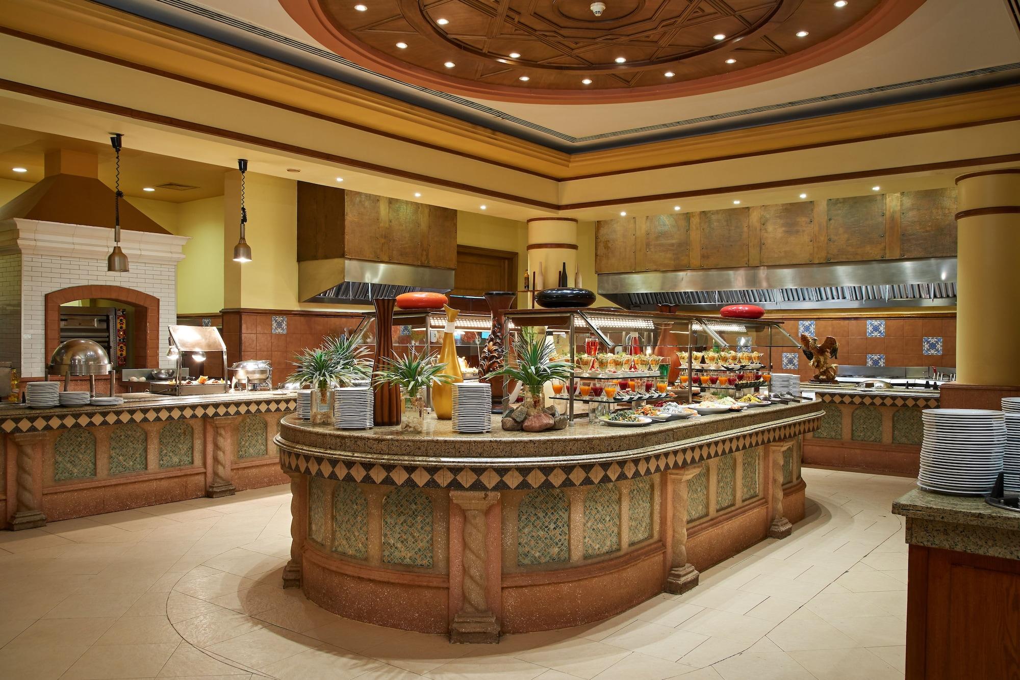Mosaique Beach Resort Taba Heights Экстерьер фото A buffet at a hotel